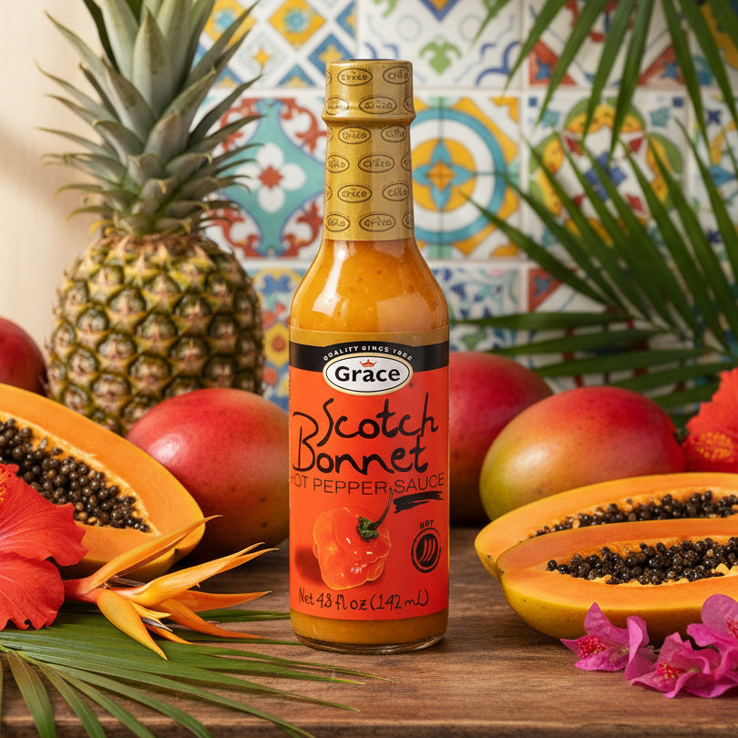 Bottle of Grace Scotch Bonnet hot pepper sauce on a white background
