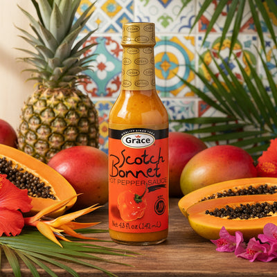 Bottle of Grace Scotch Bonnet hot pepper sauce on a white background