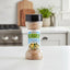 Spice jar labeled 'Grace Caribbean Traditions Vegetable Seasoning' on a white background