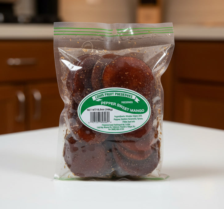 Packaged pepper sweet mangoes with a visible label on a white surface.