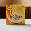 Box of wafers with caramel spread featuring 'Su Sabor' branding on a yellow background.