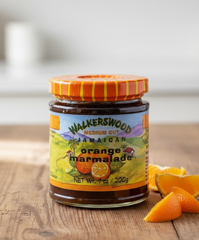 Jar of Walkerswood Jamaican Orange Marmalade with colorful label on a white background